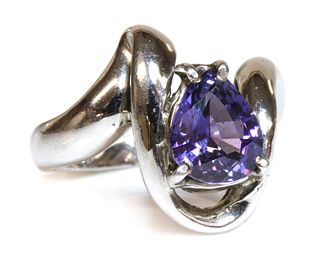 A 9ct white gold single stone purple sapphire ring,