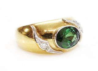 An 18ct two colour gold single stone tourmaline ring,