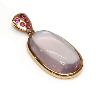 A gold rose quartz and ruby pendant,