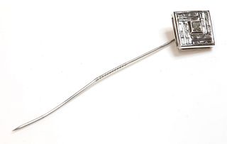 An 18ct white gold diamond set square cluster stick pin,
