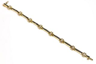 An Austrian gold sapphire and diamond bracelet,