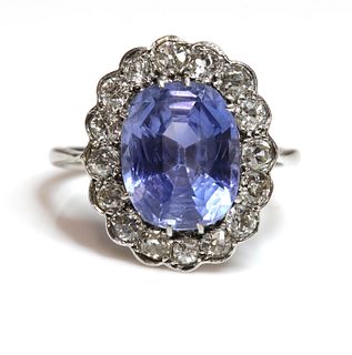 A sapphire and diamond oval cluster ring,
