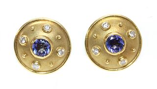 A pair of 18ct gold tanzanite and diamond circular shield form earrings,