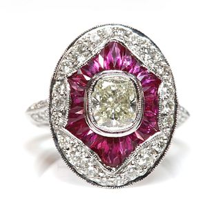 An Art Deco-style platinum diamond and ruby target cluster ring,