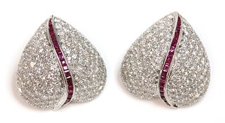 A pair of ruby and diamond heart shaped earrings,