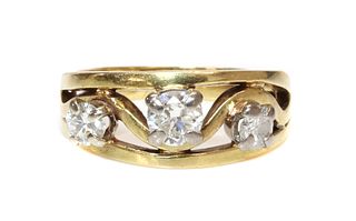 An 18ct gold three stone diamond band ring,