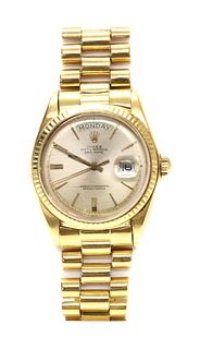 A gentlemen's 18ct gold Rolex 'Oyster Perpetual' automatic day date bracelet watch 1803, c.1973,