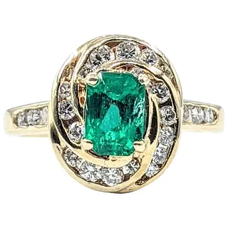 Elegant Emerald & Diamond Dress Ring