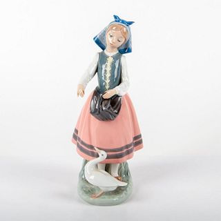 Josepha Feeding Duck 1005201 - Lladro Porcelain Figurine