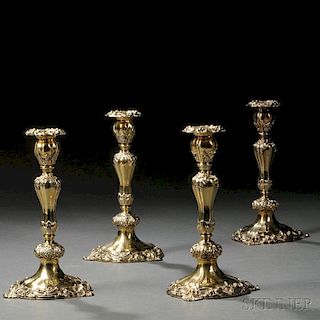 Four Victorian Silver-gilt Candlesticks