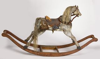 Large early Carved Rocking Horse