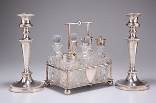 A PAIR OF 19TH CENTURY SILVER-PLATED CANDLESTICKS, with gadrooned borders, 