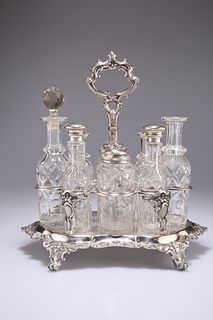 A VICTORIAN SILVER-PLATED EIGHT-BOTTLE CRUET STAND, four bottles with silve