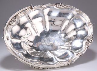 A GEORGE IV SILVER CAKE BASKET, by Benjamin Smith III, London 1826, of shap