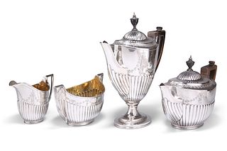 A VICTORIAN SILVER FOUR-PIECE TEA AND COFFEE SERVICE, by Walter & John Barn