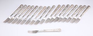A SET OF EIGHTEEN VICTORIAN SILVER-HANDLED DESSERT FORKS, by Aaron Hadfield