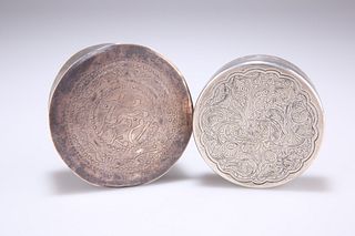 TWO PERSIAN SILVER BOXES, circular, the first 19th Century, unmarked, 8cm d