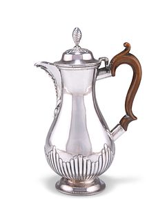 A VICTORIAN SILVER HOT WATER JUG, by Henry Holland (of Holland, Aldwinckle 