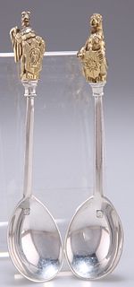 A PAIR OF ELIZABETH II SILVER AND PARCEL-GILT SPOONS, by Richard Comyns, Lo