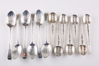 A GROUP OF SEVEN GEORGIAN SILVER TEASPOONS, various marks, with shell-form 