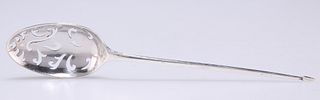 A MID 18TH CENTURY SILVER MOTE SPOON, marks indistinct, the reverse of the 