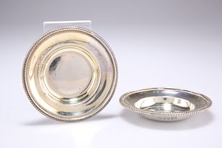 A PAIR OF GEORGE III SILVER DISHES, by Naphtali Hart, London 1811, circular