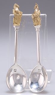 A PAIR OF ELIZABETH II SILVER AND PARCEL-GILT SPOONS, by Richard Comyns, Lo