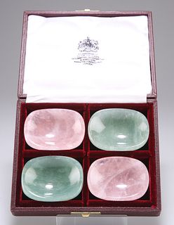 A SET OF FOUR HARDSTONE SALTS, of rounded rectangular form, in an Asprey bo