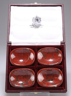 A SET OF FOUR HARDSTONE SALTS, of rounded rectangular form, in an Asprey bo