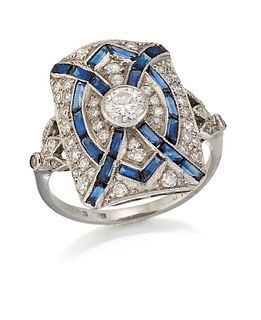 AN 18 CARAT WHITE GOLD ART DECO-STYLE SAPPHIRE AND DIAMOND RING, a round br