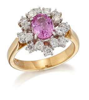 AN 18 CARAT GOLD PINK SAPPHIRE AND DIAMOND CLUSTER RING, an oval-cut pink s