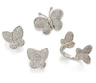 A DIAMOND BUTTERFLY SUITE, comprising: A RING, A PAIR OF EARRINGS, AND A BR