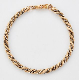 A 9 CARAT BI-COLOUR GOLD BRACELET, of twisted yellow rope and white box lin