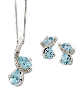 A 9 CARAT WHITE GOLD BLUE TOPAZ AND DIAMOND PENDANT ON CHAIN AND EARRING SE