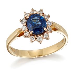 AN 18 CARAT GOLD SAPPHIRE AND DIAMOND CLUSTER RING, an oval-cut sapphire in
