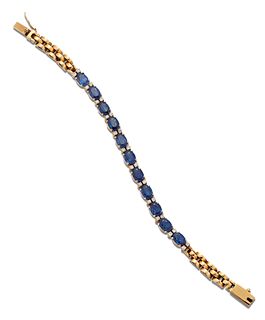 A SAPPHIRE AND DIAMOND BRACELET, oval-cut sapphires spaced by pairs of roun