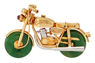 A JADE AND RUBY NOVELTY MOTORBIKE BROOCH, realistically modelled and articu