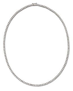 A DIAMOND LINE NECKLACE, round brilliant-cut diamonds in claw settings as a