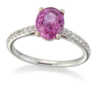 AN 18 CARAT WHITE GOLD PINK SAPPHIRE AND DIAMOND RING, an oval-cut pink sap