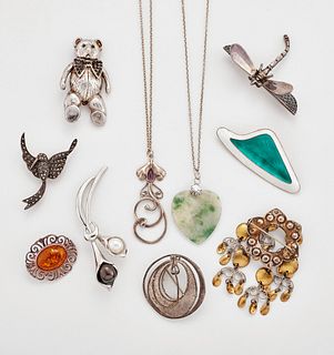 A GROUP OF JEWELLERY, including A SCANDINAVIAN SILVER-GILT AND GUILLOCHE EN