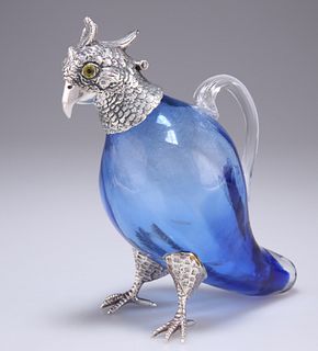 A SILVER-PLATE MOUNTED BLUE-GLASS CLARET JUG, in the form of a cockatoo, wi