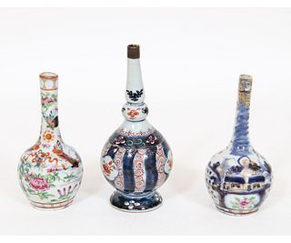 THREE EARLY CHINESE PORCELAIN BUD VASES