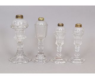 FOUR GLASS OIL LAMPS