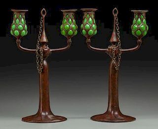 PAIR OF TIFFANY BRONZE AND GREEN FAVRILE GLASS TWO-LIGHT CANDELABRA