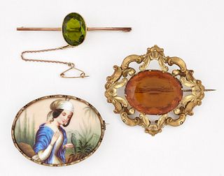 A GREEN PASTE BAR BROOCH, an oval-cut green paste in a bezel setting, to a 