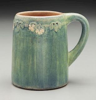 A Newcomb College Art Pottery Floral Mug, Potted by Joseph Myer, Decorated by Mary Louise Dunn