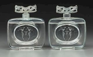 A Pair of Clear and Frosted Glass Deux Figurines, Bouchon Figurines Perfumes