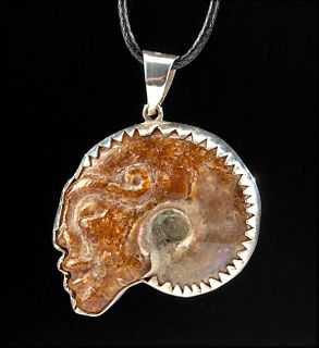 Silver Pendant w/ Fossilized Carved Ammonite
