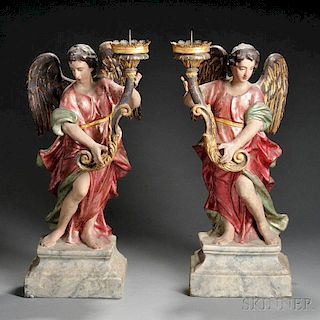 Pair of Polychrome Painted and Gilded Figural Papier-mache Candlesticks