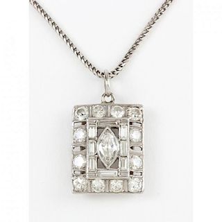 Platinum and Diamond Pendant with 14KT Chain